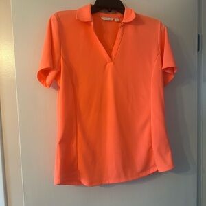Lady Hagen essential golf shirt. Orange Women's Polo Shirt